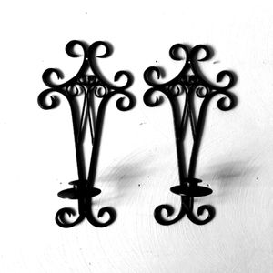 Black wrought iron metal wall mount candlholders